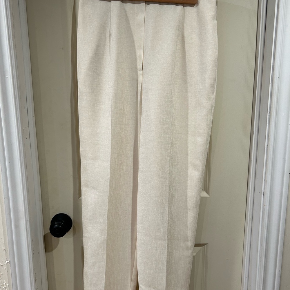 Off white polyester dress pants in size 12.
